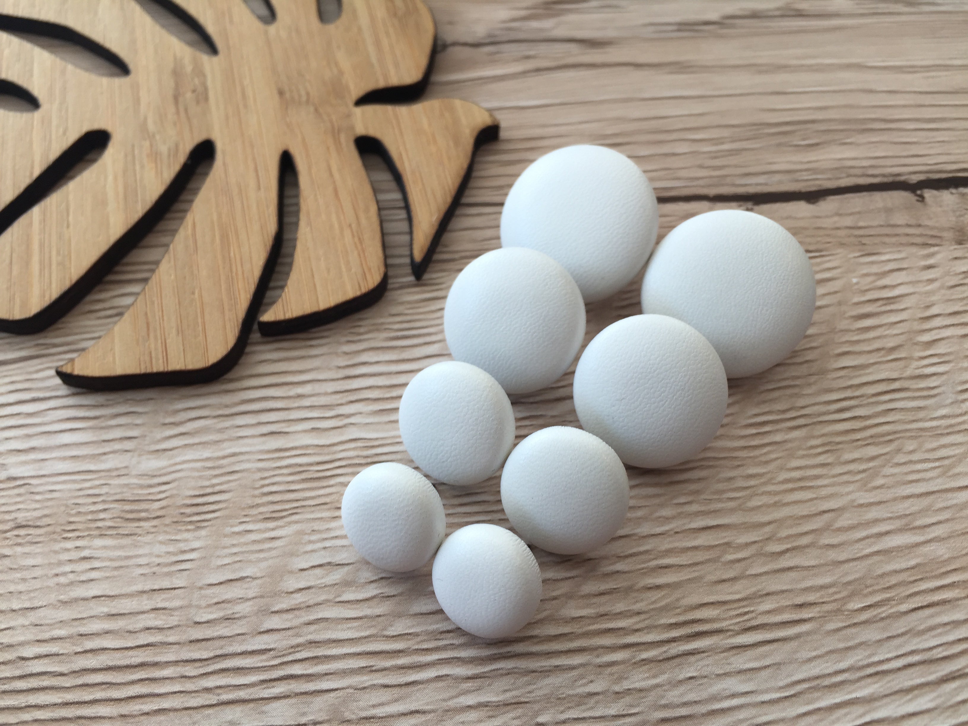 Ivory Leatherette Fabric Studs